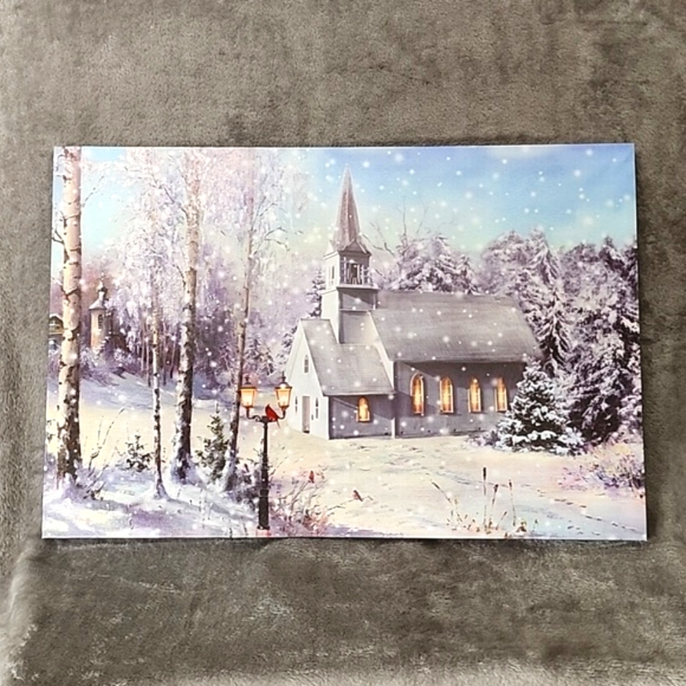 Lighted canvas wall print. Beautiful church on a snowy day.